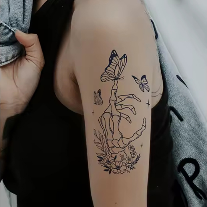 Skelett, Schmetterlinge & Blüten – Bild 1